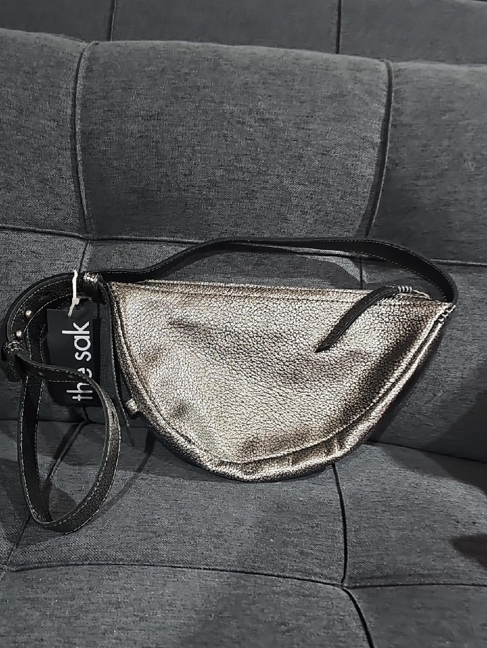The Sak Metallic Pewter Crossbody Belt Bag with Black Strap